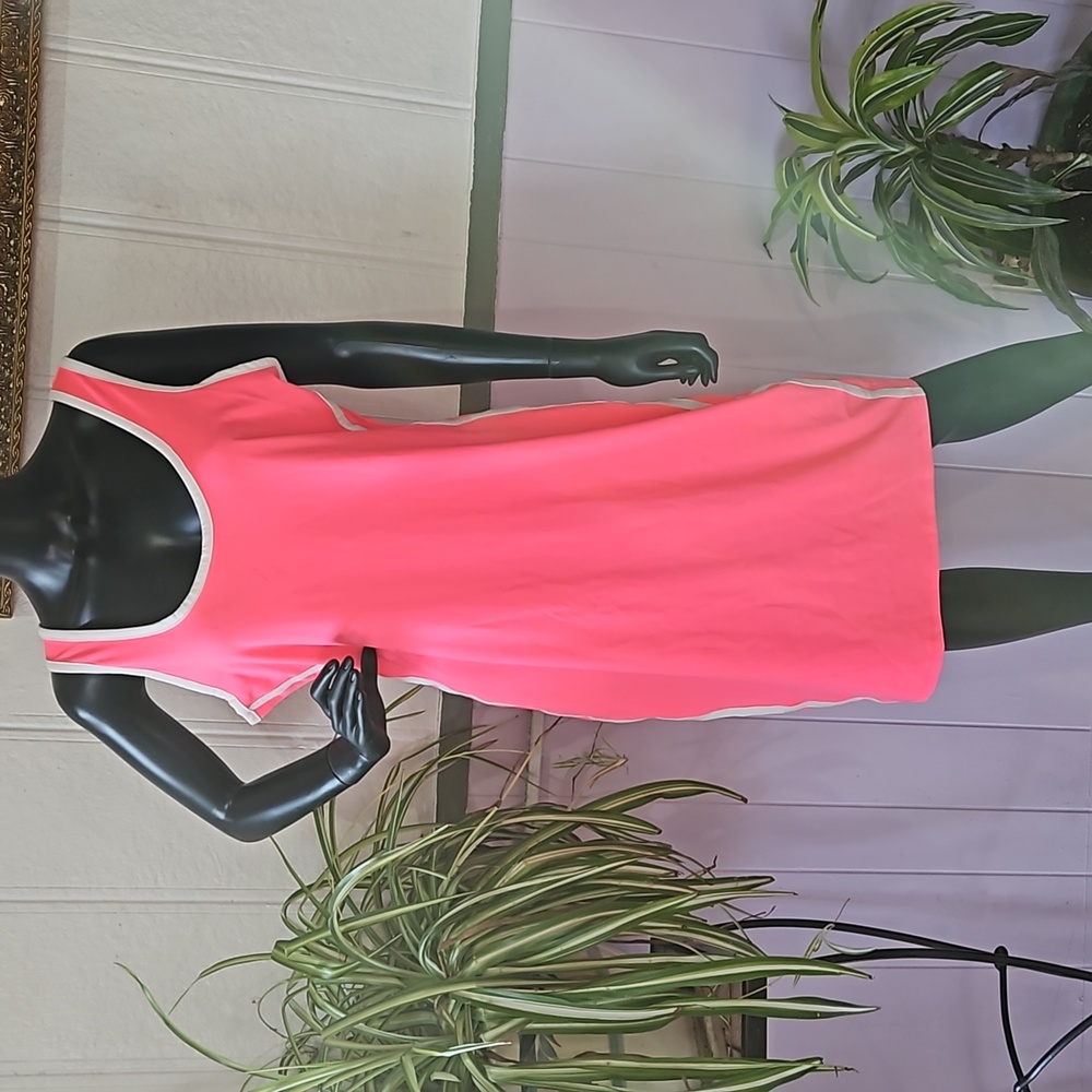 Beautiful pink dress with white stripes on the side